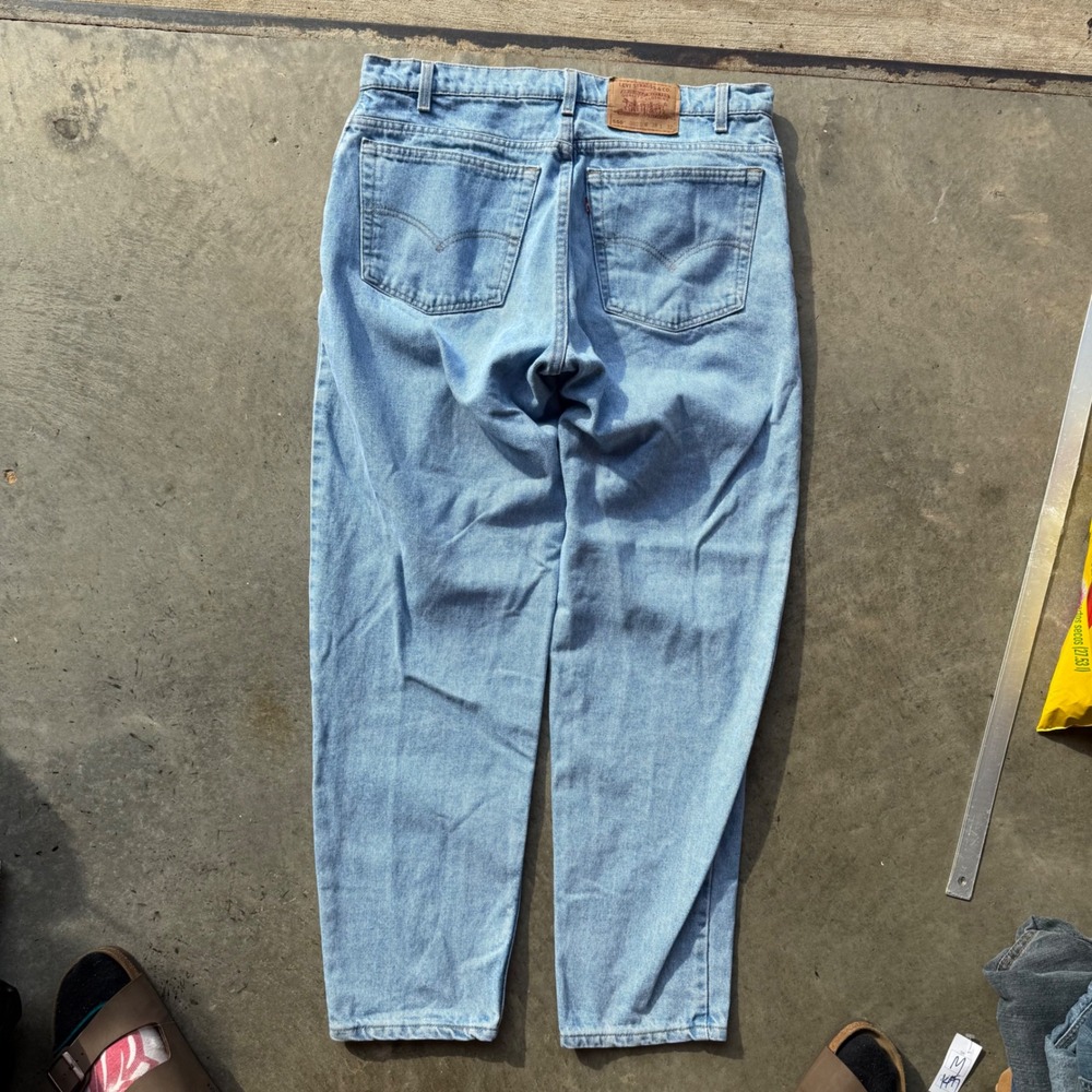 Vintage Levis 550 Relaxed Fit Tapered Leg Jeans Light Wash Made in USA 35x32